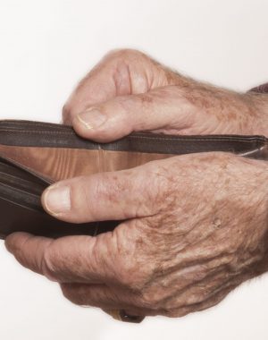 Elderly Man Shows His Empty Wallet